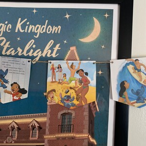 May include: A blue and white banner with a string of flags featuring characters from the Disney movie Lilo & Stitch. The flags feature Stitch, Lilo, and other characters from the movie. The banner is hanging on a wall with a framed poster behind it. The poster features the text "Magic Kingdom Under Starlight".