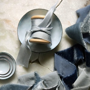 Styling dish set, a set of four miniature enamelled styling dishes in a pale dusky blue grey shade with hand-dyed blue grey silk ribbon image 1