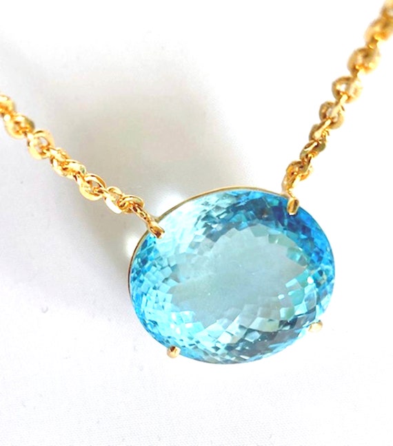 Large VVS 54.93 CTS Oval Blue Topaz 9K 