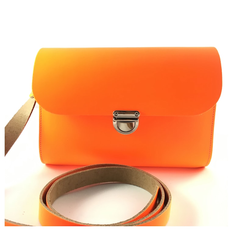 bright orange clutch bag