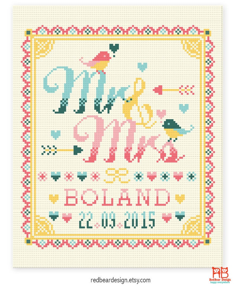 May include: Cross-stitch design featuring "Mr & Mrs" in teal, pink, and yellow, with birds and arrows. The design includes the name "BOLAND" and the date "22.09.2015" in a decorative frame. The background is a light beige color.