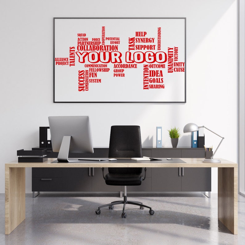 May include: A modern office with a wooden desk, black leather office chair, and a computer monitor. A framed word cloud with the words "Your Logo" in red text is hanging on the wall. The word cloud includes words related to teamwork, success, and collaboration.