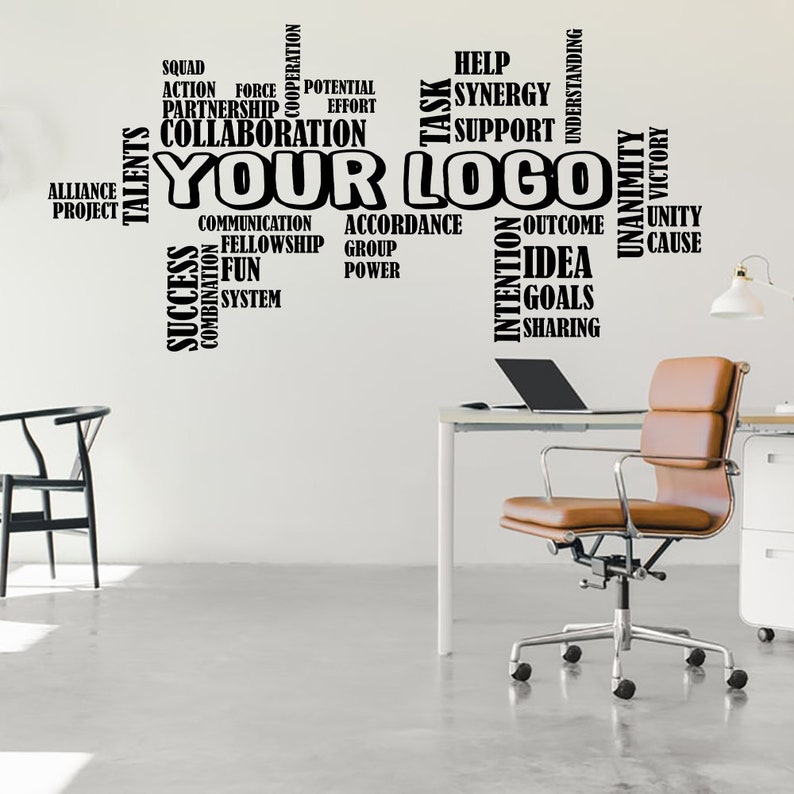 May include: A black and white word cloud with the words "Your Logo" in the center. The words around "Your Logo" are related to teamwork, success, and collaboration. The word cloud is on a white wall in an office setting.