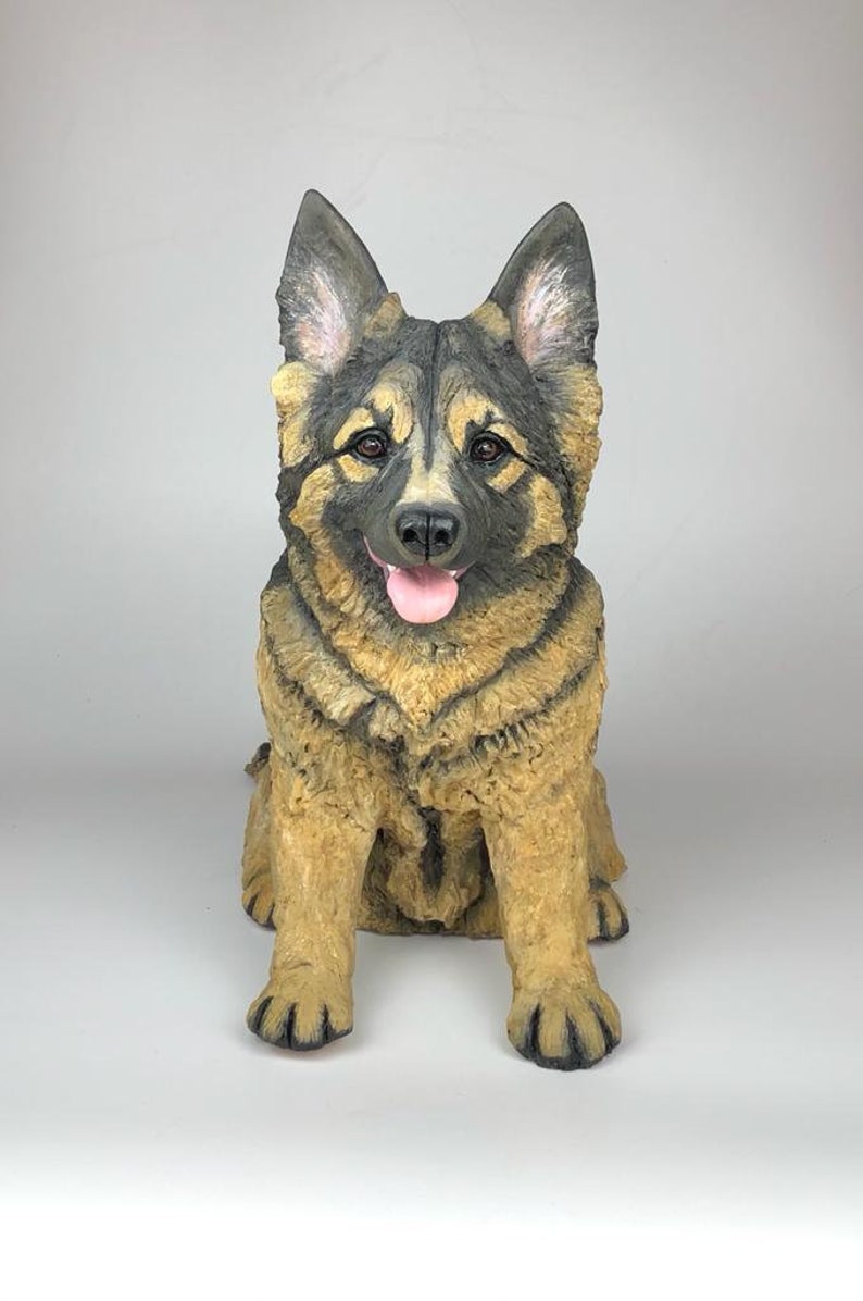German Shepherd Sculpture. Custom German Shepherd Statue Urn from your photos. 
Commission your own memorial sculpture or pet urn. 6/7 inch-19/20 inch sizes available.