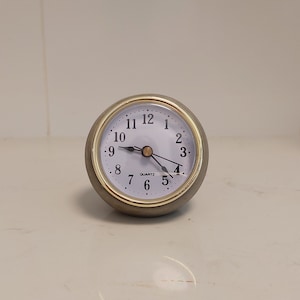 Concrete table clock, small heavy gray desk clock, ball shaped, fusion of modern and retro