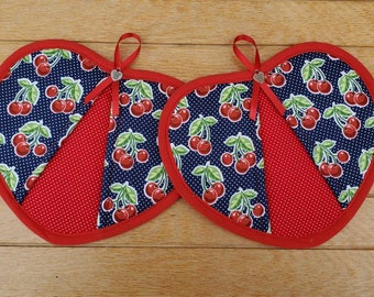 Set of two cherry with navy blue background heart shaped potholders