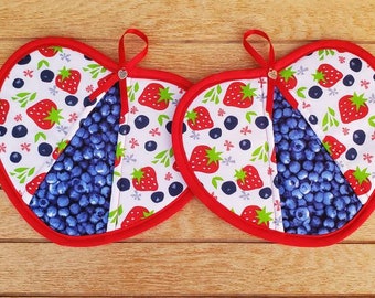 Set of two handmade blueberry and strawberry heart shaped potholders