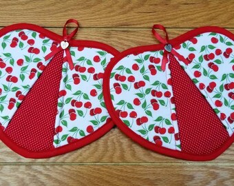 Set of two handmade heart shaped cherry potholders with a little sparkle