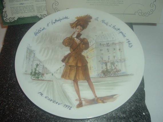 Limoges Helene the Intrepid Fashion at all Costs Plate Henri Darceau in foam box