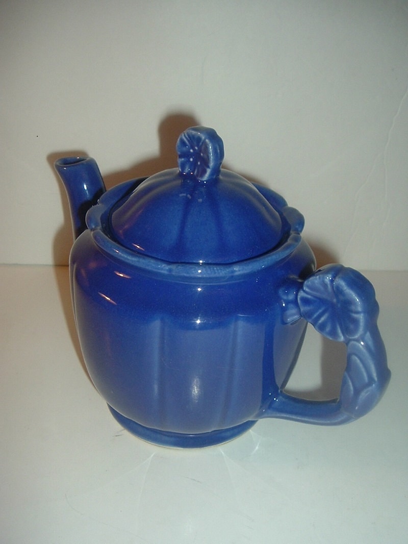 Vintage USA Blue Pottery Teapot with Flower Handle and Finial