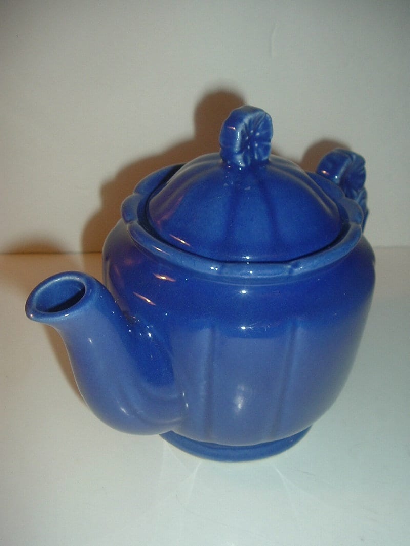 Vintage USA Blue Pottery Teapot with Flower Handle and Finial