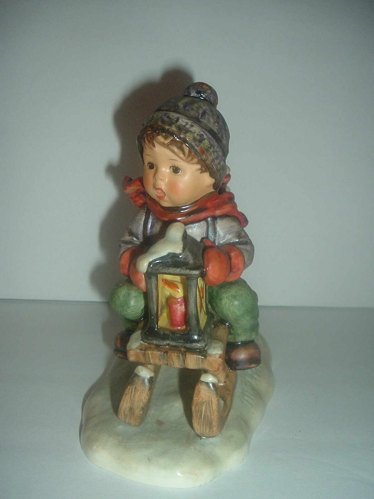 Hummel HUM 396 Ride Into Christmas Boy on Sled with Tree Figurine TMK 5