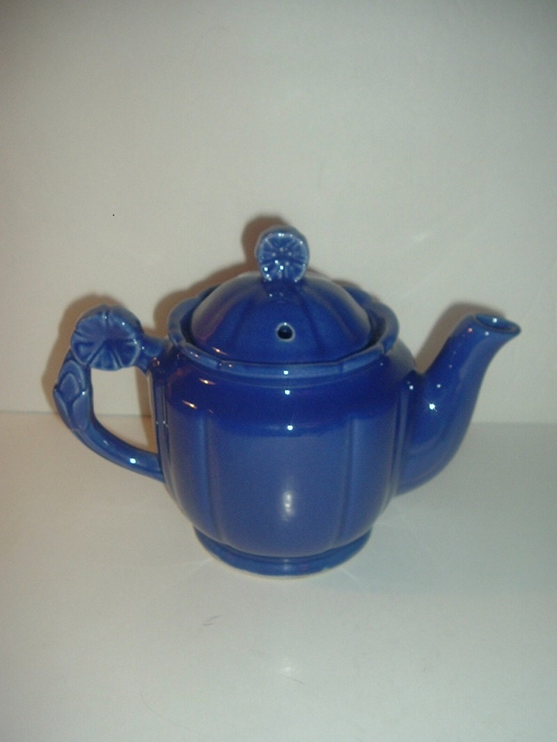 Vintage USA Blue Pottery Teapot with Flower Handle and Finial