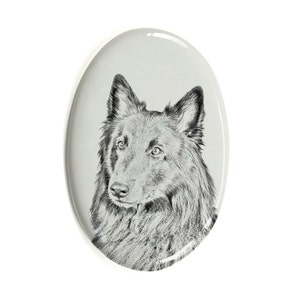 May include: A black and white illustration of a Groenendael dog on a white oval ceramic tile.