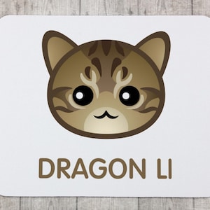 A computer mouse pad with a Dragon Li cat. A new collection with the cute Art-dog cat