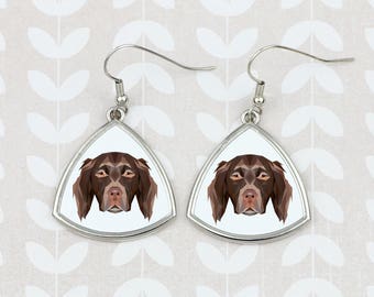 Earrings with a Münsterländer dog. A new collection with the geometric  dog