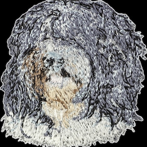 Schapendoes - Bordado con una imagen de un perro de raza.