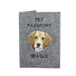 May include: Gray felt pet passport holder with an embroidered beagle dog and the text "PET PASSPORT" and "BEAGLE".