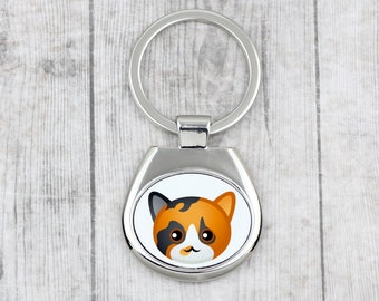 A key pendant with Calico cat. A new collection with the cute Art-dog cat