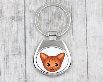 A key pendant with Abyssinian cat. A new collection with the cute Art-dog cat