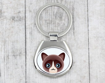 A key pendant with Snowshoe cat. A new collection with the cute Art-dog cat