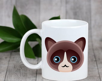 Enjoying a cup with my cat Snowshoe - a mug with a cute cat
