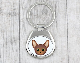 A key pendant with Oriental cat. A new collection with the cute Art-dog cat