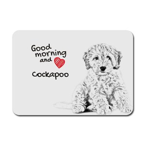 Op de afbeelding: Een zwart-witte illustratie van een Cockapoo-puppy die zit met de tekst "Good morning and Cockapoo" en een rood hart.