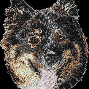 Finnish Lapphund - Bordado con una imagen de un perro de raza.