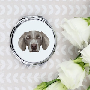 A pocket mirror with a Weimaraner dog. A new collection with the geometric dog