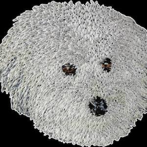 Coton de Tuléar - Bordado con una imagen de un perro de raza.