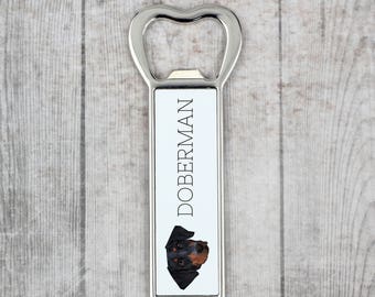 A beer bottle opener with a Dobermann dog. A new collection with the geometric dog