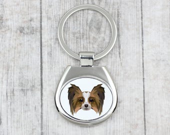 A key pendant with a Papillon dog. A new collection with the geometric dog . Dog keyring for dog lovers