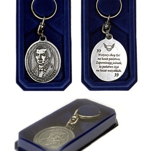 Fredreic Bastiat - silver plated, patina coated keyring coming in an elegant box.