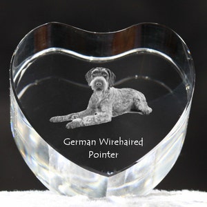 May include: A crystal heart-shaped paperweight with a 3D laser engraving of a German Wirehaired Pointer dog. The engraving includes the text "German Wirehaired Pointer".