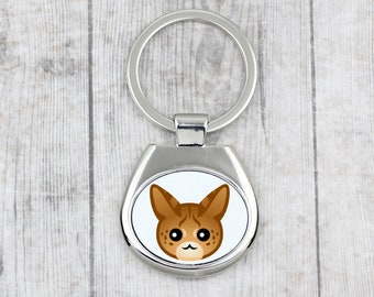 A key pendant with Savannah. A new collection with the cute Art-dog cat