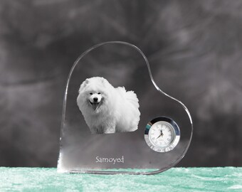 Samoyed- crystal clock in the shape of a heart with the image of a pure-bred dog.