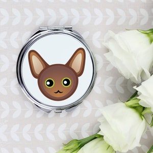 A pocket mirror with a Oriental cat. A new collection with the cute Art-Dog cat