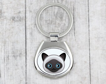 A key pendant with Himalayan cat. A new collection with the cute Art-dog cat