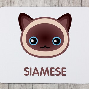 A computer mouse pad with a Siamese cat. A new collection with the cute Art-dog cat