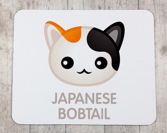 A computer mouse pad with a Japanese Bobtail cat. A new collection with the cute Art-dog cat