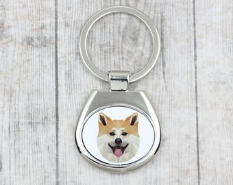 A key pendant with a  Akita Inu dog. A new collection with the geometric dog . Dog keyring for dog lovers