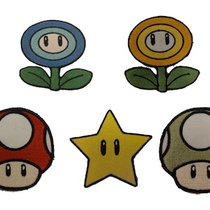 May include: Six embroidered patches featuring characters from the Super Mario video game series. The patches include a red mushroom, a green mushroom, a yellow star, a blue flower, and a yellow flower.