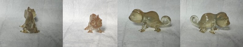Puede incluir: Cuatro figuritas de camale&oacute;n de vidrio en varias poses. Las figuritas son transl&uacute;cidas y tienen un color marr&oacute;n claro.