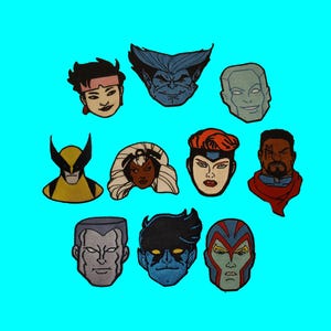 May include: A collection of ten embroidered patches featuring stylised character portraits. The designs include various figures with distinct facial features, hair colours, and headgear, rendered in vibrant thread colours against a bright cyan background.
