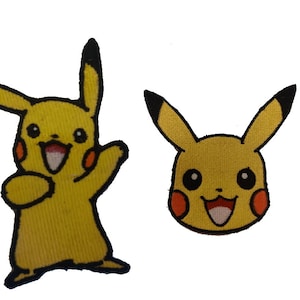 May include: Two yellow embroidered iron-on patches of Pikachu, a popular Pokemon character. One patch shows Pikachu's full body, while the other shows just Pikachu's head.