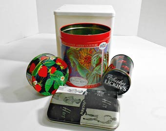 Botín publicitario, latas publicitarias, latas, lata de boy scout, lata de gato bigotes, lata de fresa negra, lata gráfica, lata de gato gatito, lata patriótica, lata linda