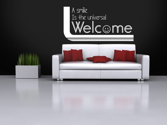 A Smile is the Universal Welcome - removable wall vinyl art decal sticker. Various sizes and colours available.