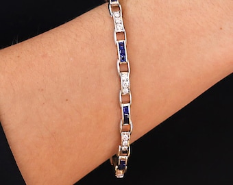 Pulsera Art Déco de platino con zafiros de talla francesa y diamantes en línea recta