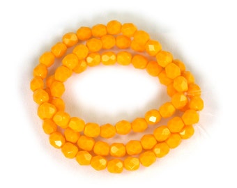 Yellow Orange opaque 6mm firepolished rounds. Set of 25 or 50.